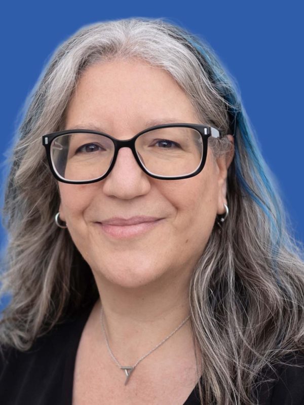 NAE, PNG, headshots in blue 2 (1298 x 1455 px) - 3. Cara Sheehan